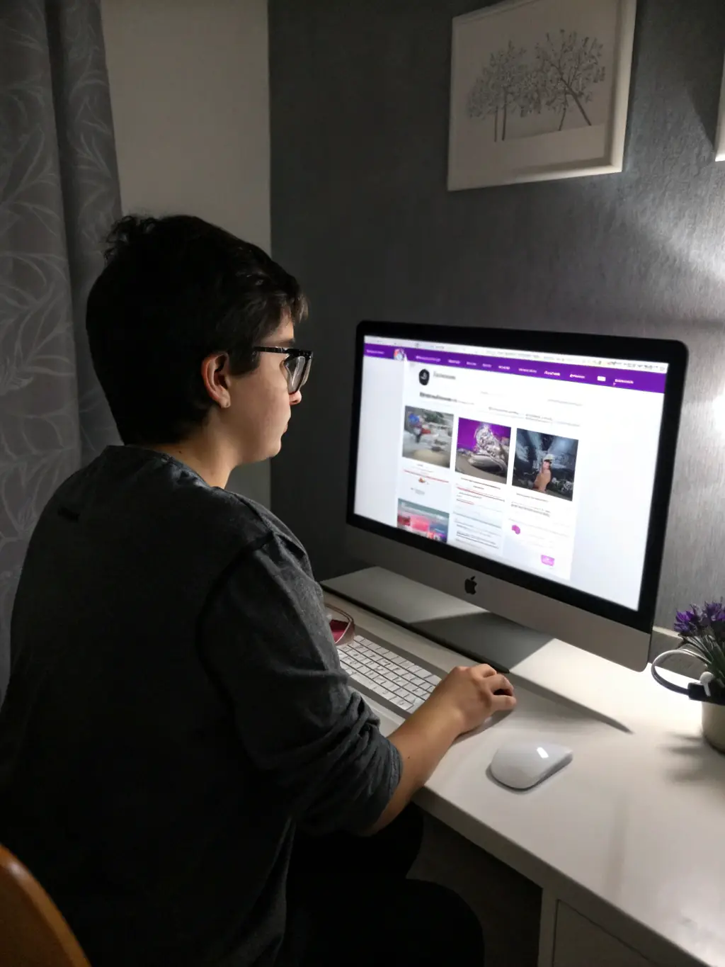 An image of a content creator optimizing website content on a laptop, surrounded by SEO tools and drafts, representing increased organic traffic.